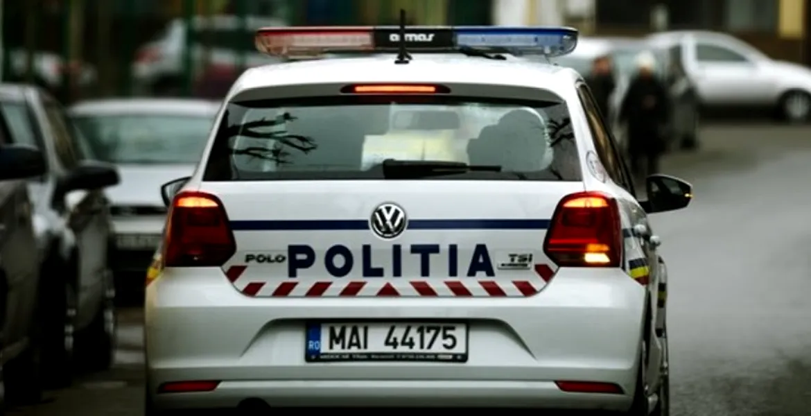 Un poliţist a fost reţinut după ce a cerut bani unui şofer ca să nu îi treacă alcoolemia în raport