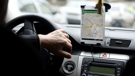 Noua lege a taximetriei a fost promulgată. Cum răspunde Uber în România