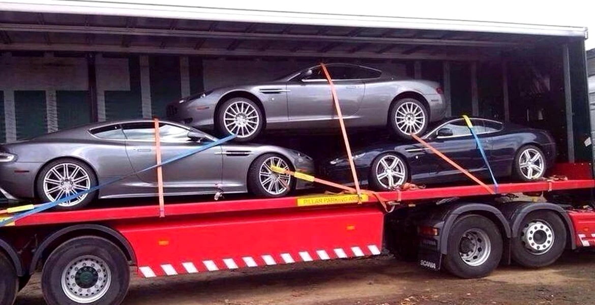 Trei Aston Martin într-un TIR? Poza asta îţi creează, literalmente, durere