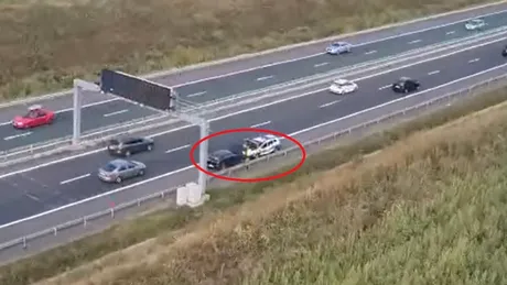 Mașină de poliție, surprinsă în timp ce stătea pe banda de urgență pe autostradă. Ce făcea, de fapt, acolo?