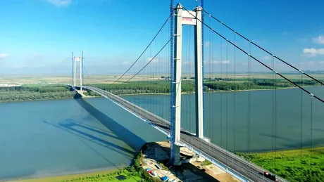 CNAIR câștigă un proces pentru întârzieri la finalizarea podului de la Brăila. Constructorul italian Webuild mai are și alte căi de atac 