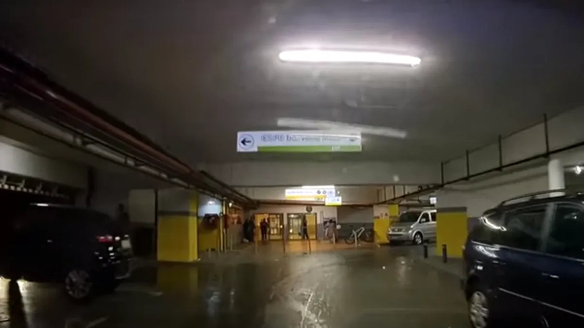 Şofer de BMW, pus la punct într-o parcare din Bucureşti - VIDEO