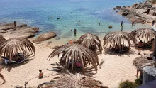 Cum a fost 'ușurat' un turist român de 3.000 de euro, pe plaja Tigania din Halkidiki