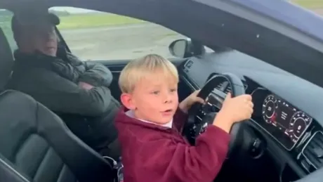 Un copil de 6 ani face launch control cu un Volkswagen Golf R