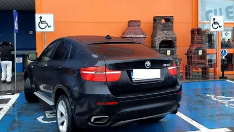 BMW X6 parcat pe locul rezervat persoanelor cu handicap. Reacția șoferului când a fost fotografiat