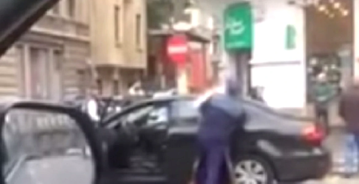 Şoferiţă încătuşată în centrul Bucureştiului, după ce a trecut pe roşu, apoi s-a certat cu poliţia – VIDEO