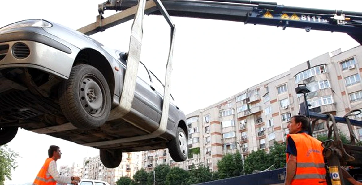 Atenţie mare unde parchezi: Poliţiştii din Bucureşti au ridicat maşini pe bandă rulantă