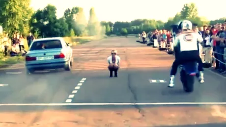 VIDEO: Culmea penibilului - o liniuţă între un BMW şi o motocicletă se termină prost