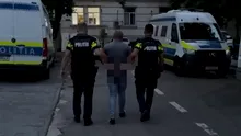 Doljean reținut după ce a tras cu arma în polițiști și și-a terorizat familia