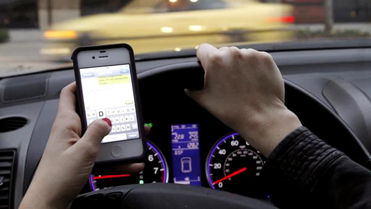 Apple va restricţiona expedierea de SMS-uri în timpul condusului