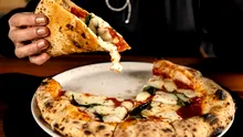 Criză în America! Cât a ajuns să coste o banală pizza cu brânză
