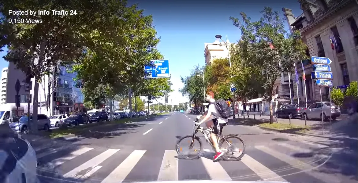Video: Ce păţeşte un biciclist care traversează pe roşu în timp ce merge pe bicicletă?
