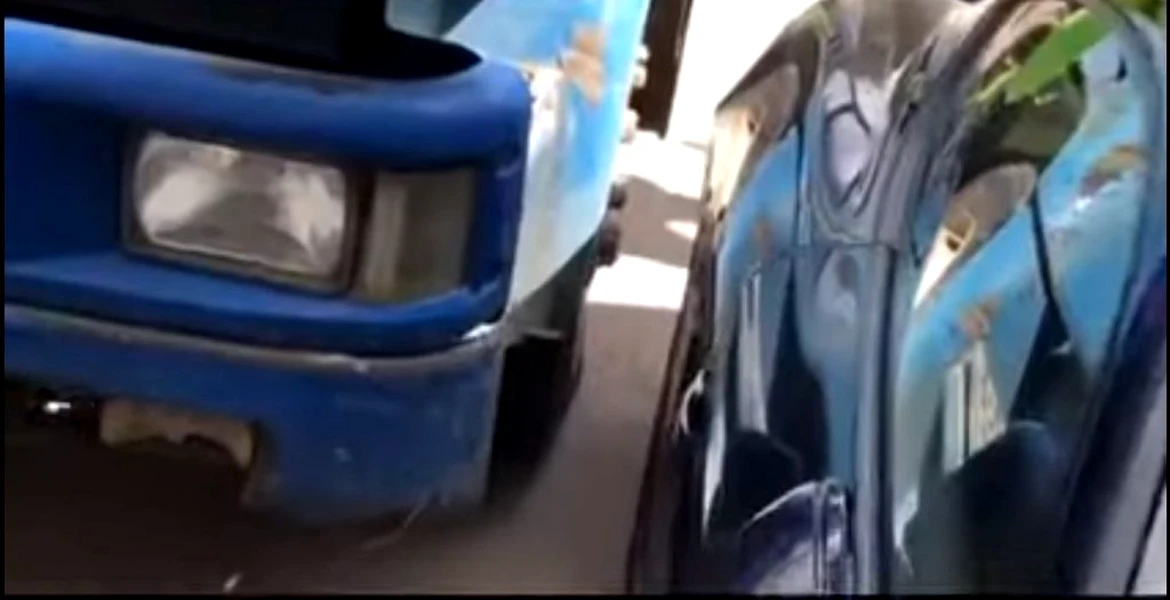 Video: A oprit un camion cu forţa mâinilor chiar înainte de a intra într-un Porsche!