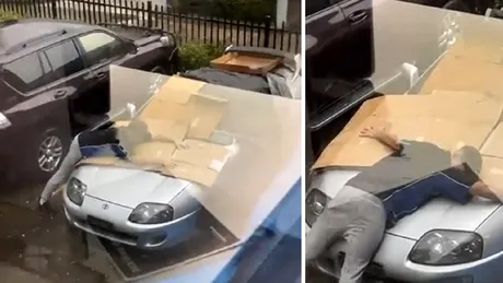 Un bărbat își folosește propriul corp pentru a-și proteja mașina de o furtună cu grindină - VIDEO