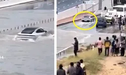 Porsche Taycan traversează cu ușurință o stradă complet inundată – VIDEO