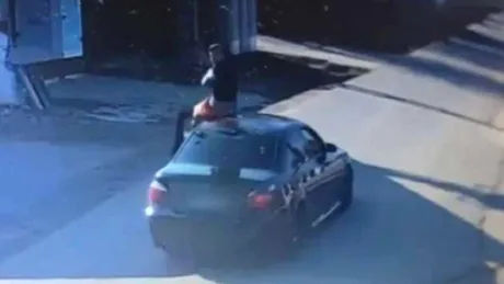 Dosar penal pentru un tânăr care a stat pe acoperișul mașinii, un BMW Seria 5, în mers