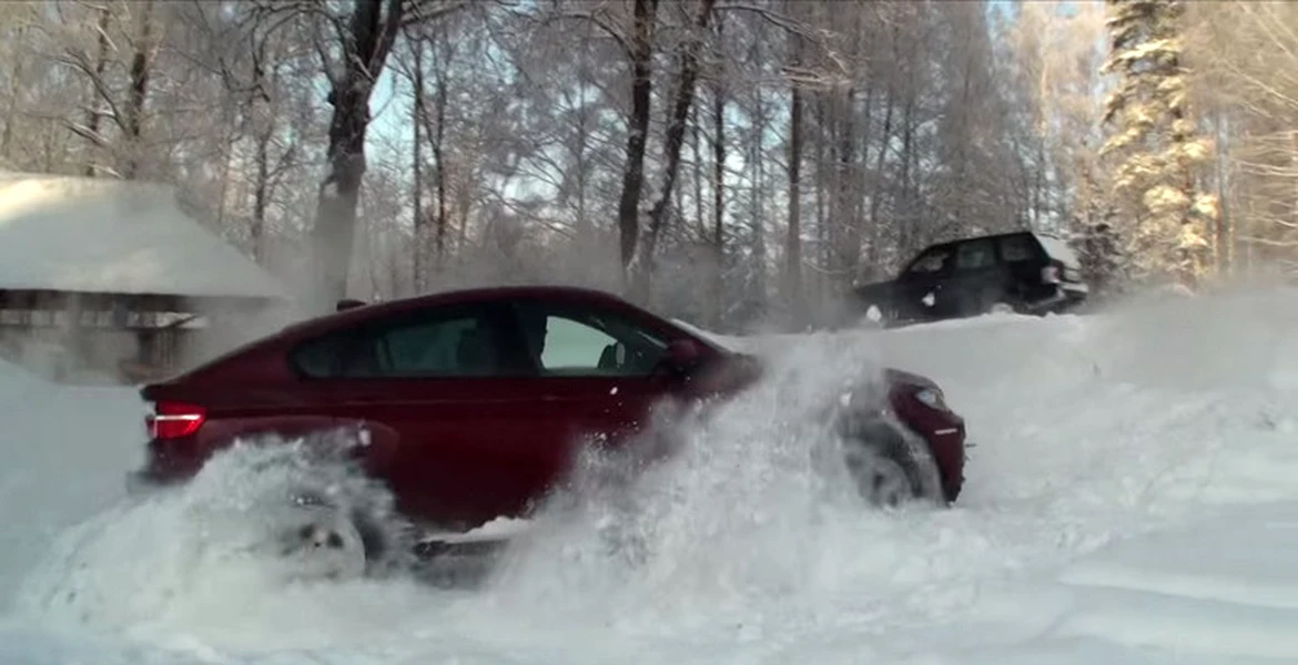 BMW X6 vs Range Rover şi Toyota Land Cruiser pe zăpadă. VIDEO